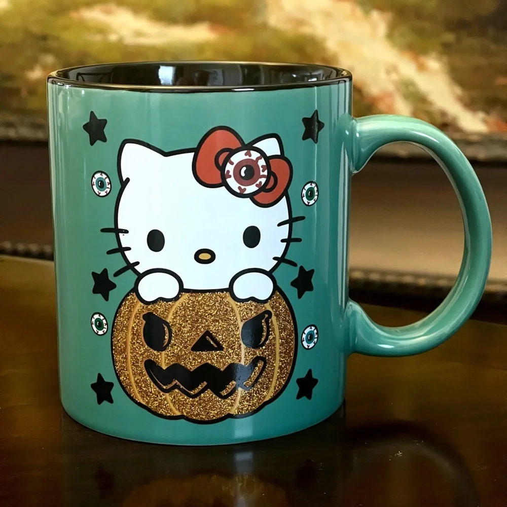 2022 Sanrio Ceramic Halloween Jack-O-Lantern Pumpkin Hello Kitty Teal Mug - NEW - Picture 2 of 2